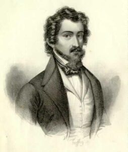 grabado que muestra a Espronceda en un traje con corbata de su tiempo, el pelo oscuro y rizado y bigotes con barba corta